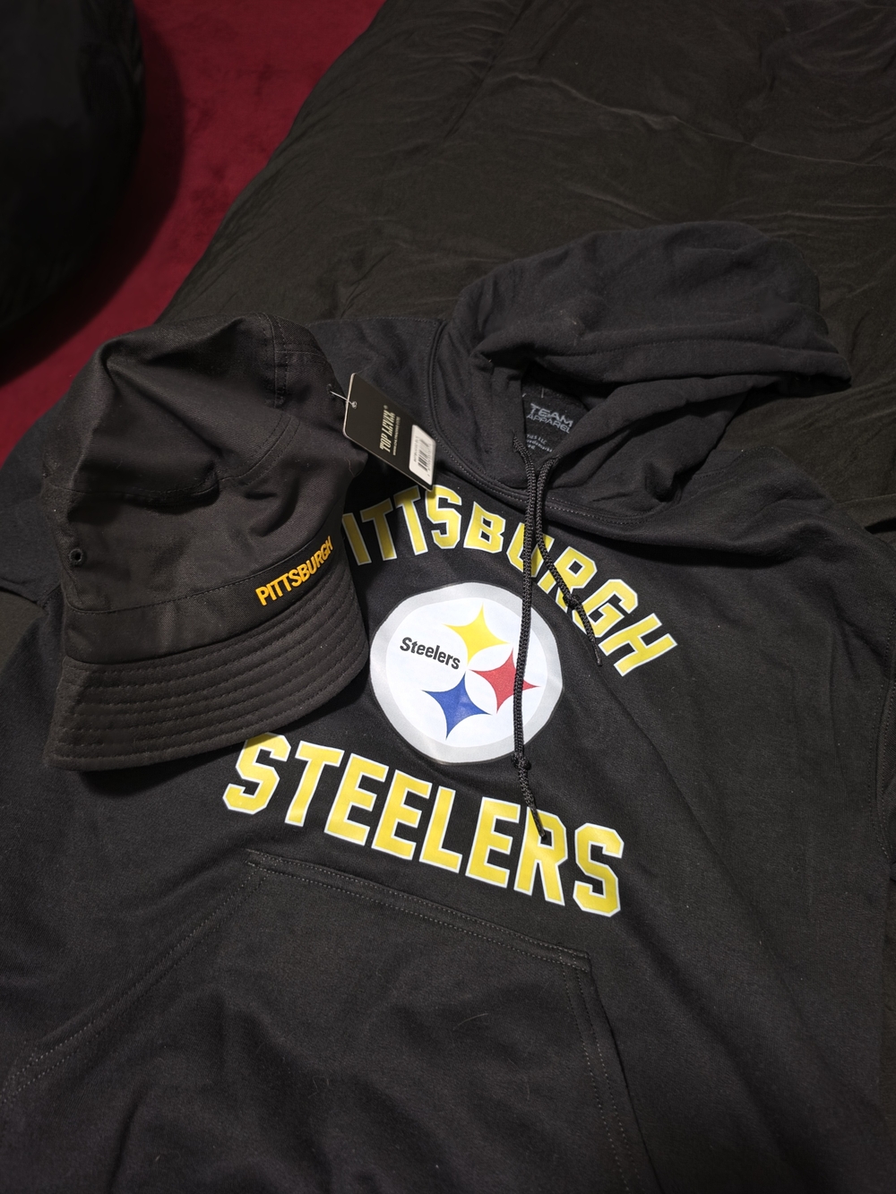 Team Apparel Black Hoodie with Subtle White Tag Graphic